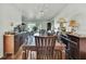 An inviting dining room with hardwood floors, chandelier, and dark wood furniture at 4388 Tiffin Ave, Spring Hill, FL 34609