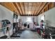 Spacious garage with laundry area and fitness equipment, offering practicality and functionality at 4502 19Th Street Cir W, Bradenton, FL 34207