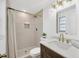 Updated bathroom featuring stylish tiles, modern vanity, and a tiled shower at 525 Gornto Lake Rd, Brandon, FL 33510