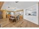 Dining room with dark wood table and chairs with built-in storage adjacent to the kitchen at 525 Gornto Lake Rd, Brandon, FL 33510