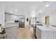 Modern kitchen boasts stainless steel appliances, and ample counter space at 525 Gornto Lake Rd, Brandon, FL 33510