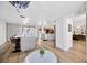 Spacious kitchen area boasts stainless steel appliances and a large island with bar stool seating at 525 Gornto Lake Rd, Brandon, FL 33510