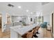 Modern kitchen boasts a large island with seating, stainless steel appliances, and ample counter space at 525 Gornto Lake Rd, Brandon, FL 33510