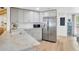 Modern kitchen featuring stainless steel appliances, light grey cabinetry, and sleek countertops at 525 Gornto Lake Rd, Brandon, FL 33510