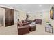 Upstairs bonus room with a custom barn door and comfortable leather seating for a relaxed atmosphere at 6154 Marsh Trail Dr, Odessa, FL 33556