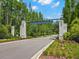 A beautiful entryway welcomes residents and visitors to the well-manicured, amenity-rich Tarramor community at 6154 Marsh Trail Dr, Odessa, FL 33556