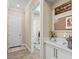 Mud room features a countertop, cabinets, personalized decorations and signage leading to the laundry and another room at 6154 Marsh Trail Dr, Odessa, FL 33556