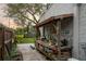 Outdoor workspace with a rustic wooden counter with shelving, ideal for gardening, DIY projects, or hobbies at 6251 4Th S Ave, St Petersburg, FL 33707