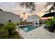 Relaxing backyard featuring a sparkling pool, beautiful patio, hammock, and ample seating at 6251 4Th S Ave, St Petersburg, FL 33707