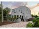 Charming exterior view of a two-story home with unique architectural details at 6251 4Th S Ave, St Petersburg, FL 33707