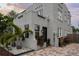 Charming home showcasing unique architectural details, manicured landscaping, and a welcoming entrance at 6251 4Th S Ave, St Petersburg, FL 33707