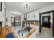 Bright kitchen with white cabinets, butcher block countertops, stainless steel appliances, and decorative tile flooring at 6251 4Th S Ave, St Petersburg, FL 33707