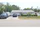 Charming home with well-maintained landscaping, a neatly kept lawn, and a welcoming curb appeal at 6318 Ridge Crest Dr, Port Richey, FL 34668