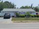 Charming home with well-maintained landscaping, a neatly kept lawn, and a welcoming curb appeal at 6318 Ridge Crest Dr, Port Richey, FL 34668