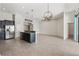 Spacious kitchen with island, stainless steel appliances, and open floor plan at 6670 Paden Wheel St, Zephyrhills, FL 33541