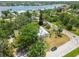 Charming waterfront home with lush trees and a view of the tranquil river, providing a serene escape at 695 Sunset Dr, Tarpon Springs, FL 34689
