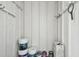 Ample storage space with paint supplies and organization racks at 695 Sunset Dr, Tarpon Springs, FL 34689