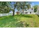Spacious, fenced backyard with a shed and ample green space at 7013 Early Gold Ln, Riverview, FL 33578