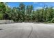 Outdoor basketball court with benches and landscaping in a community setting at 7013 Early Gold Ln, Riverview, FL 33578