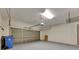 Clean, empty garage with an automatic door and ample space for vehicles at 7013 Early Gold Ln, Riverview, FL 33578