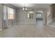 Living room with luxury vinyl plank flooring and neutral walls at 7013 Early Gold Ln, Riverview, FL 33578