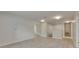 Bright loft area featuring wood-look floors and access to bedrooms at 7013 Early Gold Ln, Riverview, FL 33578