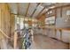 Interior of a backyard shed with workbench and ample storage space at 7013 Early Gold Ln, Riverview, FL 33578
