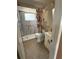 Bathroom featuring a walk-in shower, classic vanity and tile floors at 7021 Mayfield Dr, Port Richey, FL 34668