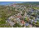 Wide aerial view of the community and surrounding waterways at 77 Gulfwinds Dr, Palm Harbor, FL 34683