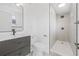 Modern bathroom with a sleek vanity, updated toilet, and a stand-up shower with eye-catching tile at 7991 54Th N St, Pinellas Park, FL 33781