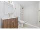 Updated bathroom boasts a modern vanity, decorative fixtures, and walk-in shower with tile surround at 7991 54Th N St, Pinellas Park, FL 33781