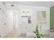 Hallway with modern finishes and a recessed display area with decorative lighting, connecting to the living space at 7991 54Th N St, Pinellas Park, FL 33781