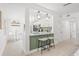 Eat-in kitchen features stainless steel appliances, stylish pendant lighting, and a breakfast bar with seating at 7991 54Th N St, Pinellas Park, FL 33781