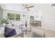 Inviting living area with bright lighting, a stylish sofa set, and an easy flow to the entryway at 7991 54Th N St, Pinellas Park, FL 33781
