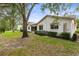 Exterior view of home with landscaping at 8175 Sturbridge # 8175, Weeki Wachee, FL 34613