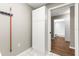 Hallway featuring storage closet, tile flooring, and access to the bathroom at 8175 Sturbridge # 8175, Weeki Wachee, FL 34613