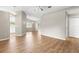 Spacious living room featuring wood flooring, vaulted ceiling, and ample natural light at 8175 Sturbridge # 8175, Weeki Wachee, FL 34613