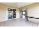 Covered patio featuring tile flooring, ceiling fan, and sliding glass doors at 8175 Sturbridge # 8175, Weeki Wachee, FL 34613