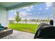A beautifully landscaped backyard and a relaxing patio offers a serene outdoor living space at 8192 Ivy Stark Blvd, Wesley Chapel, FL 33545