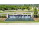This community entrance has a beautiful fountain and landscaping to welcome residents and visitors at 8192 Ivy Stark Blvd, Wesley Chapel, FL 33545
