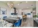 Open-concept space with view of the kitchen, dining area, and living room at 8192 Ivy Stark Blvd, Wesley Chapel, FL 33545