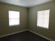 Bright bedroom with dual windows and vinyl flooring, perfect for a cozy retreat at 844 20Th S St, St Petersburg, FL 33712