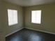 Well-lit bedroom with two windows and vinyl flooring throughout at 844 20Th S St, St Petersburg, FL 33712