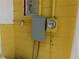 Exterior shot of the house's electrical panel and meter at 844 20Th S St, St Petersburg, FL 33712
