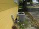 Exterior side view of the home showing the HVAC unit at 844 20Th S St, St Petersburg, FL 33712