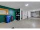 Large garage space with containers and shelving to keep things organized at 9013 White Sage Loop, Lakewood Ranch, FL 34202