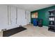 Garage featuring ample storage with utility containers and shelving at 9013 White Sage Loop, Lakewood Ranch, FL 34202