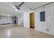 Spacious garage with sealed concrete flooring, ample lighting and electric panel at 9013 White Sage Loop, Lakewood Ranch, FL 34202
