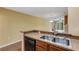 A modern kitchen sink and breakfast bar top at 9013 White Sage Loop, Lakewood Ranch, FL 34202