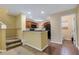 Inviting kitchen featuring wood cabinets and tiled flooring at 9013 White Sage Loop, Lakewood Ranch, FL 34202